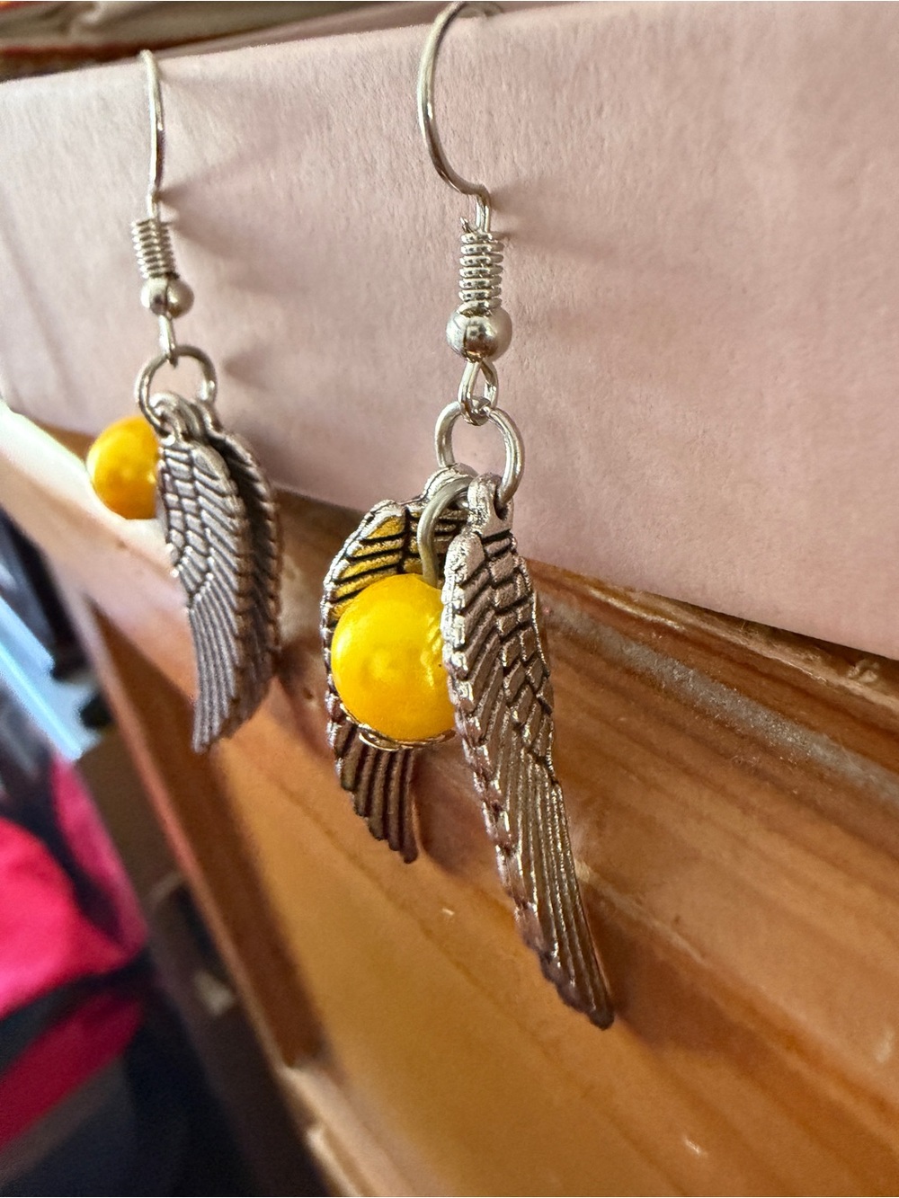 Silver Angel Wing Earrings with Yellow Bead - Picture 2 of 3